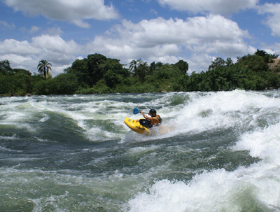 Surfing the 'Nile Special' on the White Nile in Uganda